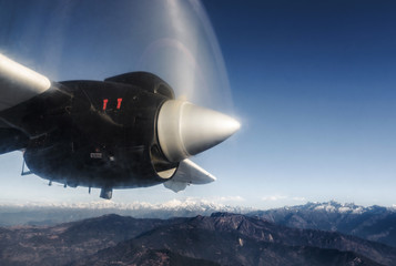 Naklejka na ściany i meble The Himalayas from a propeller plane, Nepal. Flight Kathmandu to Lukla.