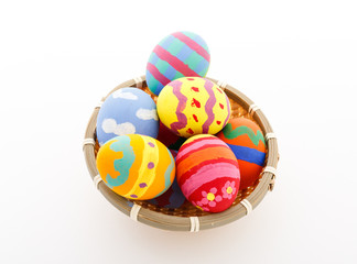 Child painted Easter egg in basket