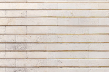 Big light yellow stone building wall texture