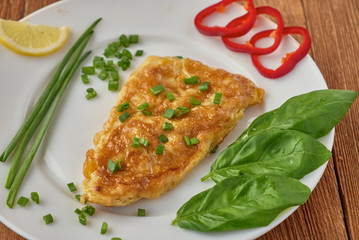 Fried fish fillet with vegetables