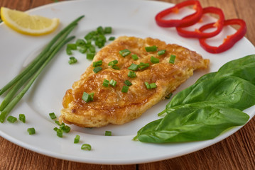 Fried fish fillet with vegetables