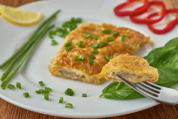 Fried fish fillet with vegetables