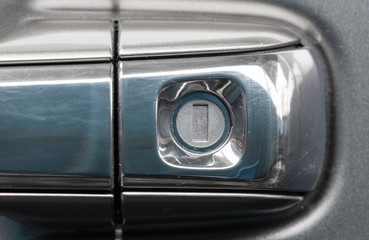 Obraz premium Lock on the door handle of the car