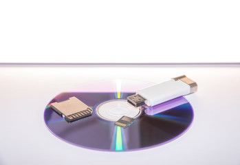 optical disc, sd card, micro sd und usb drive data storage devices on white background