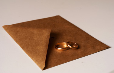 Preparation for wedding. Two rings. Vintage envelope. family life