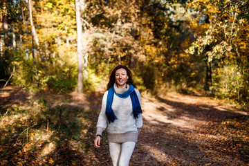 A woman having fun in autumn outdoors