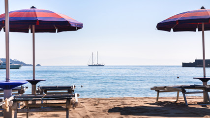 urban beach in giardini naxos town in morning