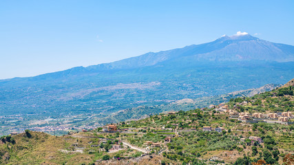 Fototapeta na wymiar panorama with villages and Etna volcano in Sicily
