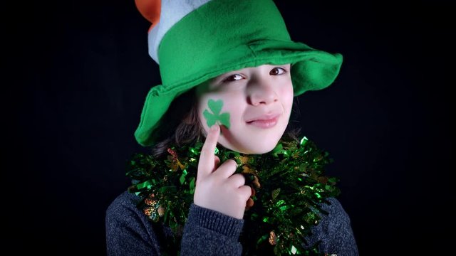 4K Child Celebrating St. Patrick's Day Showing his Make-up