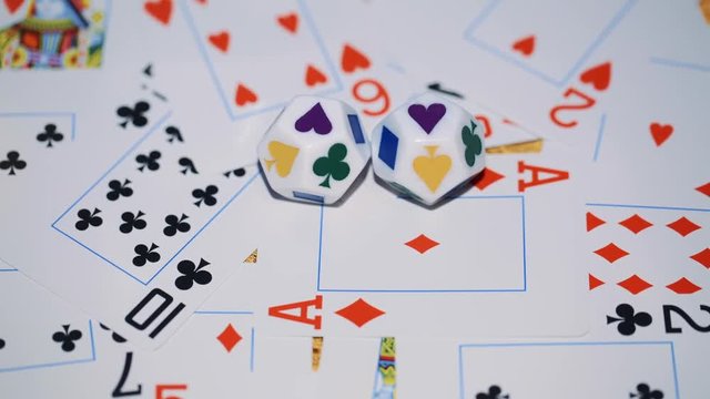 playing cards scattered on a table.