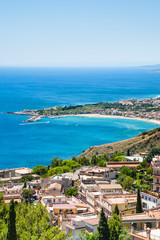 Fototapeta na wymiar view of Taormina city and giardini naxos beach