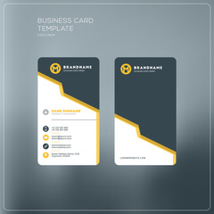 Vertical business card print template. Personal business card with company logo. Black and yellow colors. Clean flat design. Vector illustration. Business card mockup