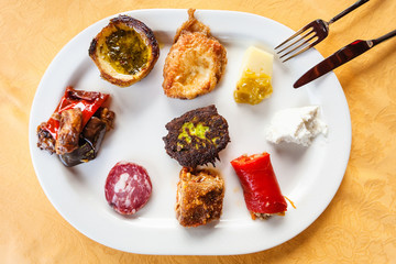 top view plate with various sicilian snacks