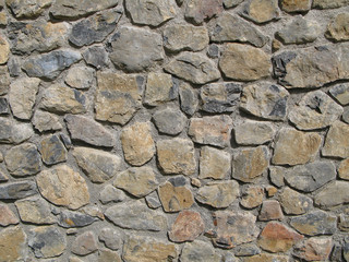 Mur en pierres taillées d'une maison de village
