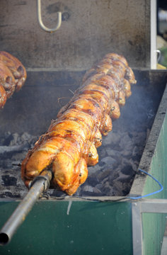 Grilled and roasted chicken covered with tasty sauce and spice.