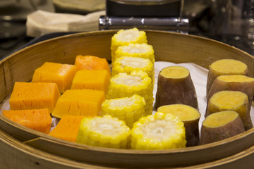 Boiled corn, sweet potatoes and pumpkin in the hotel's buffet restaurant 