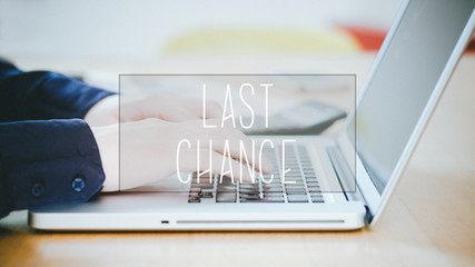 Last Chance, text over young man typing on laptop at desk