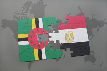 puzzle with the national flag of dominica and egypt on a world map