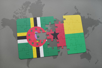 puzzle with the national flag of dominica and guinea bissau on a world map