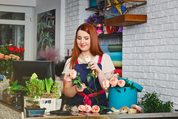 young girl working in a flower shop