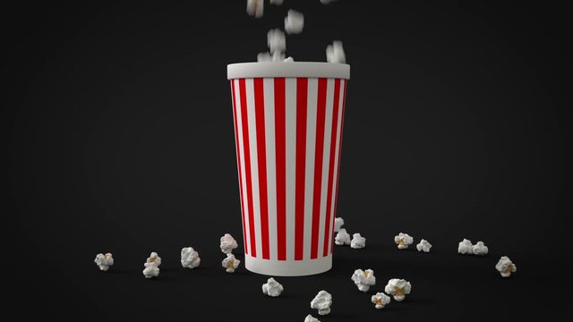 Popcorn falling down and filling striped paper cup packing for watching film entertainment in cinema theater full-hd video. Black background 3d rendered animation.