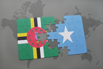 puzzle with the national flag of dominica and somalia on a world map
