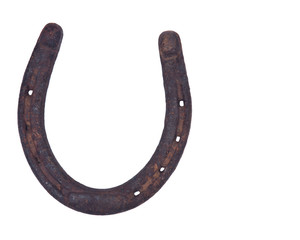 Old rusty vintage good luck horseshoe isolated on white background