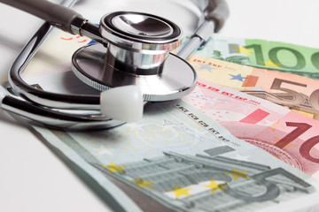 European currency with doctor stethoscope. Medical and money for social insurance or social security. Planning for retirement medical expenses concept.