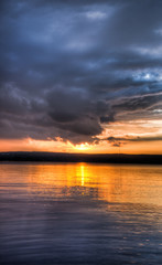 Fototapeta na wymiar Sundown over an lake