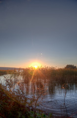 Fototapeta na wymiar Sundown over an lake