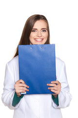 Young female student doctor with a tablet on a white background