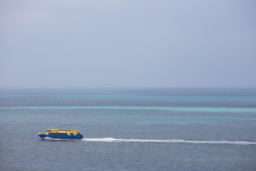 Big passenger ship going in the middle of ocean. 