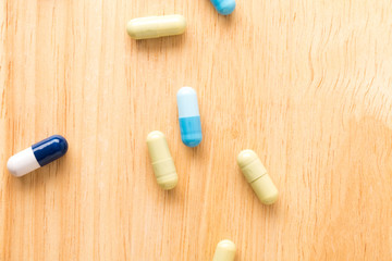 Fototapeta na wymiar Colorful medicine pills and capsules