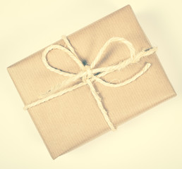 Rustic parcels gift box with kraft paper.