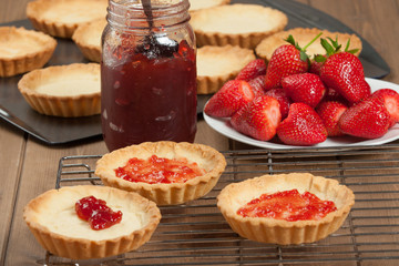 Homebaked Strawberry Tartlets With Ganache. Decoration Process Stage.