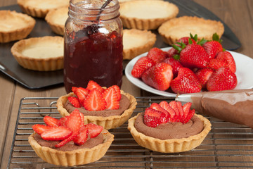 Homebaked Strawberry Tartlets With Ganache. Jam.