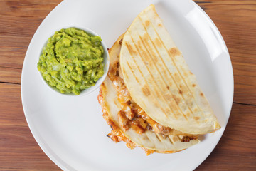 Quesadilla with guacamole sauce