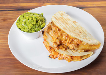 Quesadilla with guacamole sauce