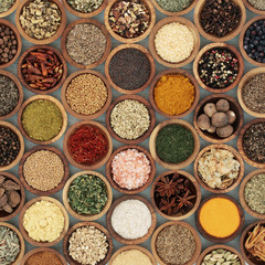 Herb and Spice Seasoning in Wooden Bowls. Large selection.