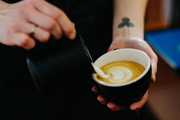 Barista making fresh coffee capuccino. Coffee Preparation Service Concept