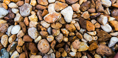 A lot of colorful stones texture view from above.