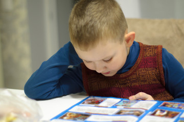 boy reading a book