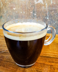 Americano Coffee on wooden surface copy space