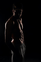 Fototapeta na wymiar Young muscular man posing
