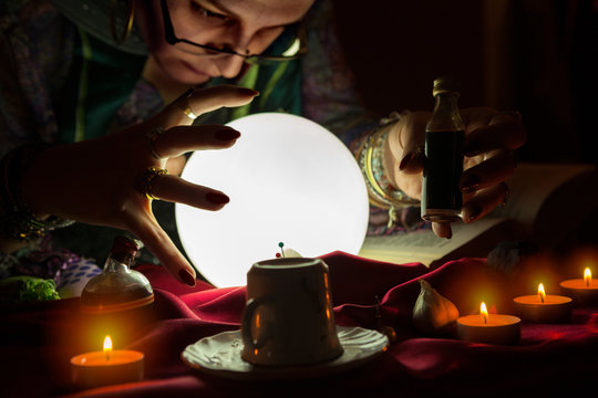 Female fortune teller with love potion