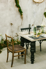 Wedding tableware and other elements of festive table wedding centerpieces decorations.
