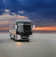 Fototapeta na wymiar bus on asphalt in the evening on sunset