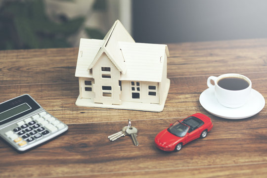 House Model With Car On Table