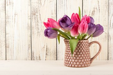 Fresh colorful tulips bouquet in jug