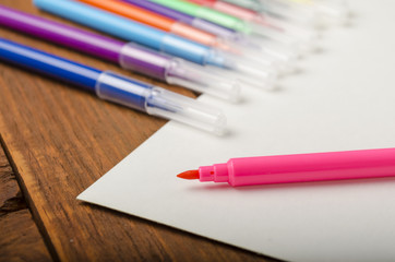 Colored felt-tip pens with white sheet